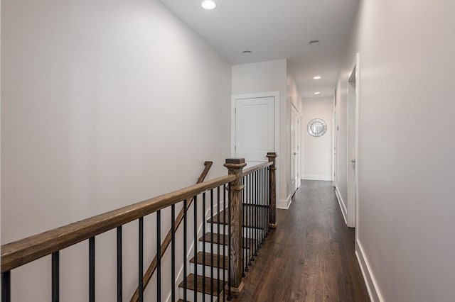 hallway featuring dark hardwood / wood-style flooring