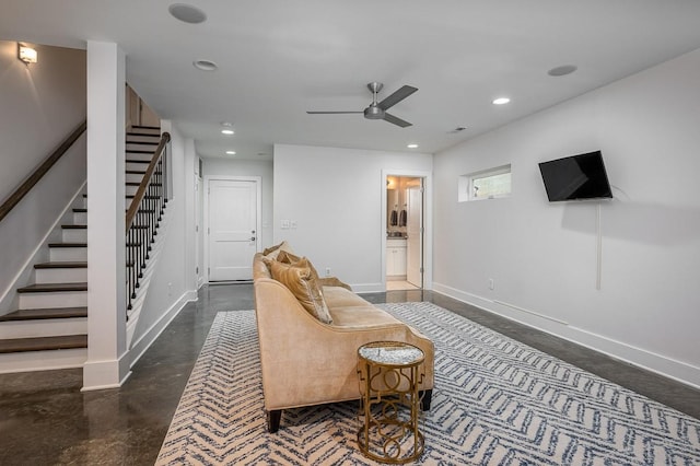 living room featuring ceiling fan