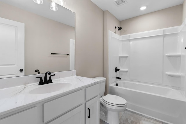 full bathroom featuring tile patterned floors, vanity, toilet, and shower / bathtub combination