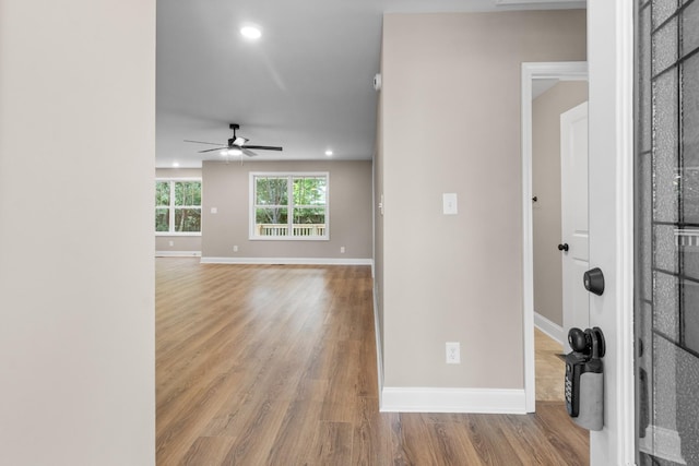 interior space featuring ceiling fan and light hardwood / wood-style flooring