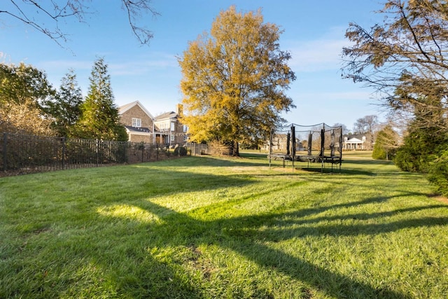 view of yard with a trampoline