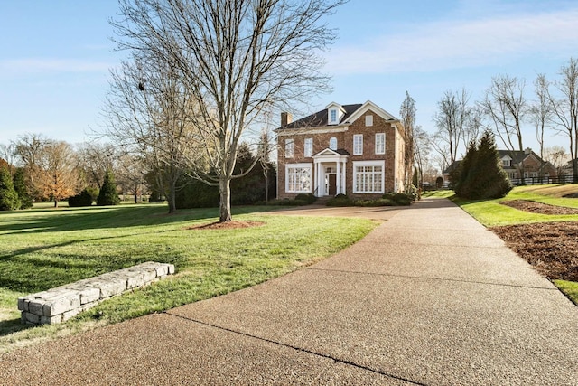 view of front of home with a front yard