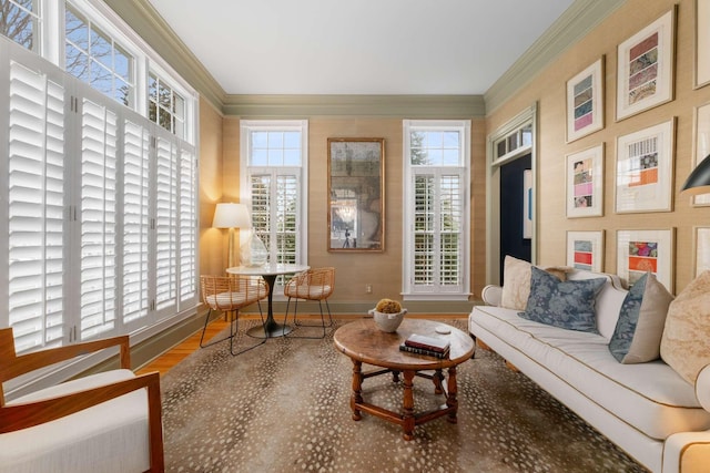 interior space featuring wood-type flooring and crown molding