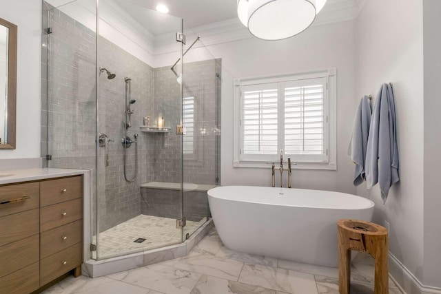 bathroom with vanity, crown molding, and independent shower and bath