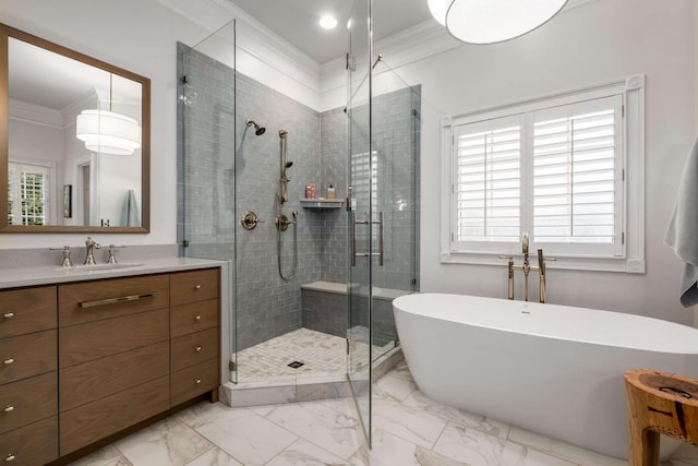 bathroom featuring vanity, ornamental molding, and shower with separate bathtub