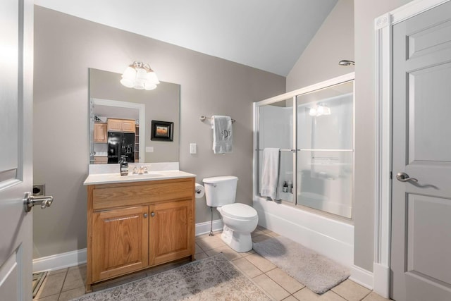 full bathroom with combined bath / shower with glass door, tile patterned floors, vanity, toilet, and lofted ceiling