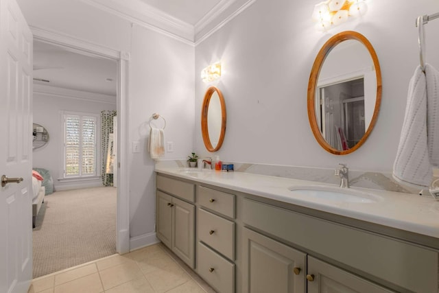 bathroom with tile patterned floors, vanity, and ornamental molding