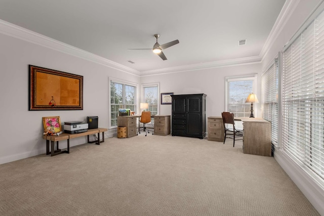 interior space with carpet flooring, ceiling fan, and ornamental molding