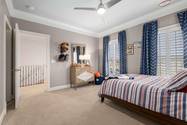 bedroom with ceiling fan, crown molding, and light colored carpet