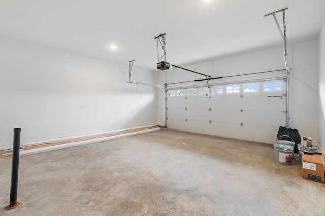 garage featuring a garage door opener