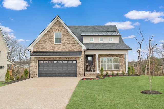 craftsman-style house featuring a front yard and a garage