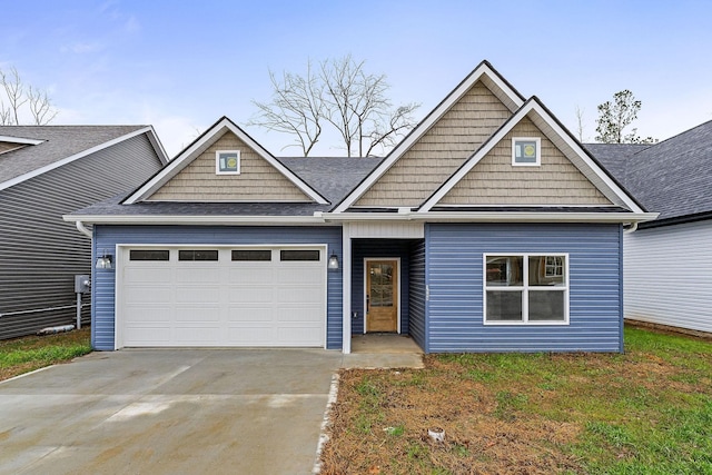 craftsman house with a garage