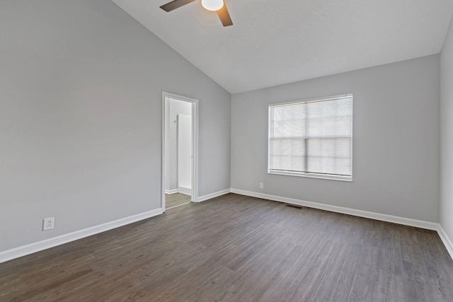 unfurnished room featuring ceiling fan, dark hardwood / wood-style flooring, and lofted ceiling