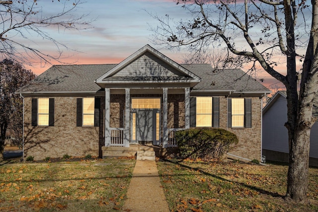 view of front of home featuring a yard