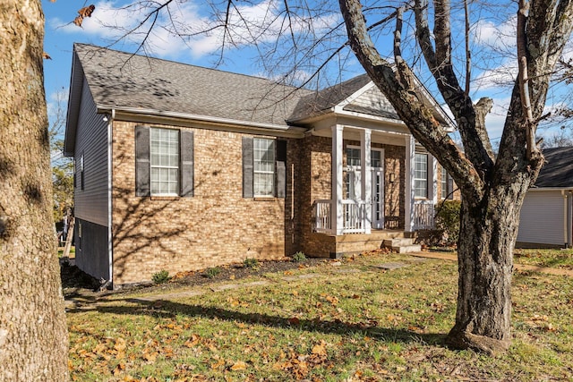 ranch-style home featuring a front yard