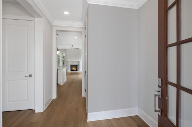 7085 Bolton St, Franklin, TN 37064 - hallway with wood finished floors, recessed lighting, and crown molding