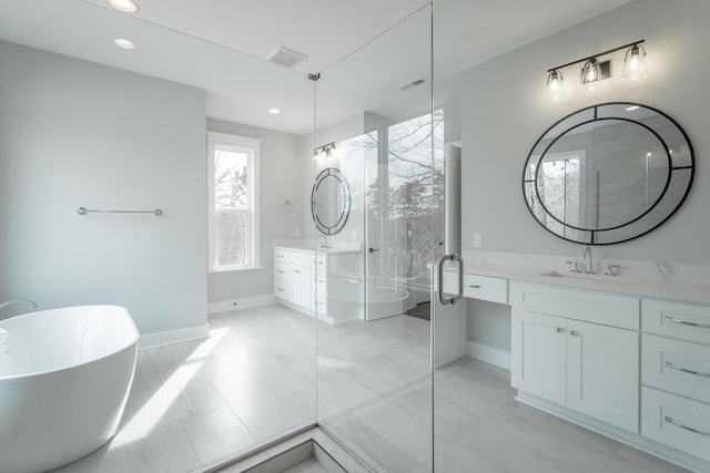 bathroom with vanity and plus walk in shower