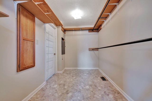 walk in closet with electric panel