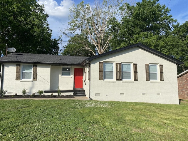 view of front of house with a front lawn