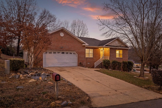 single story home featuring a garage