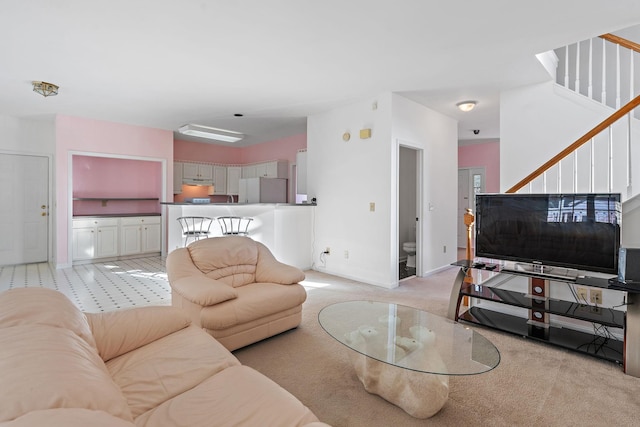 living room with light colored carpet