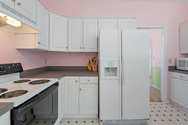 kitchen with white cabinets, white appliances, and range hood