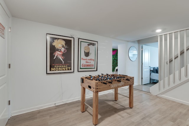 game room featuring light hardwood / wood-style flooring