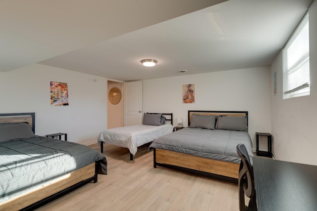 bedroom featuring light hardwood / wood-style flooring