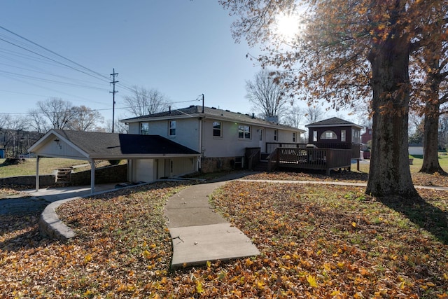 exterior space featuring a gazebo and a deck