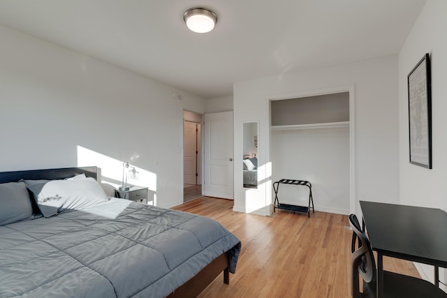 bedroom with light hardwood / wood-style flooring