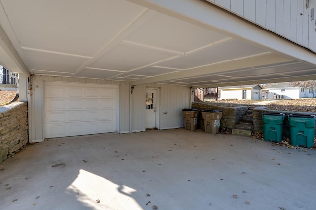 garage with a carport