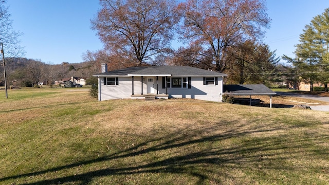 view of front of home featuring a front lawn