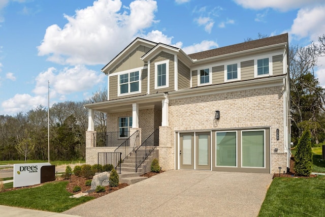 craftsman-style house with a front yard