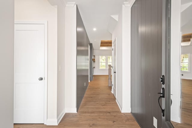 hall with light hardwood / wood-style floors