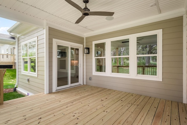 wooden deck with ceiling fan