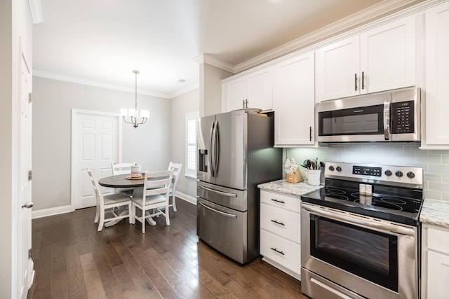 kitchen with white cabinets, appliances with stainless steel finishes, and dark wood-type flooring