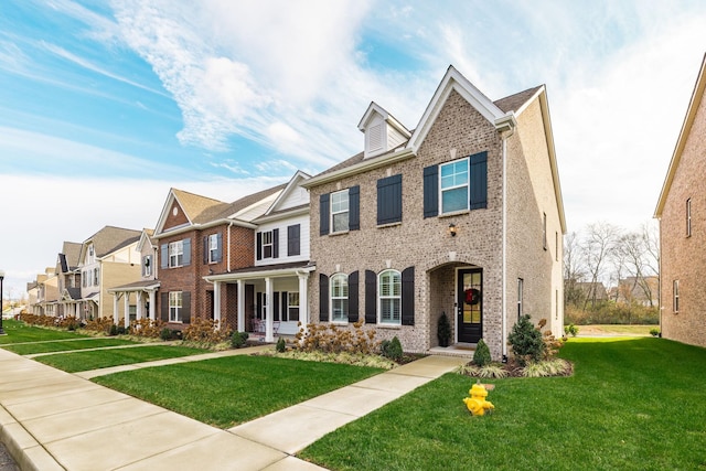 view of front of house featuring a front lawn