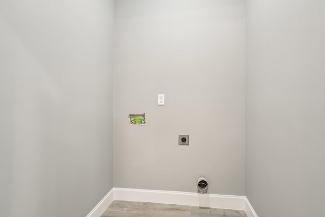 laundry room with hookup for an electric dryer, wood-type flooring, and hookup for a washing machine