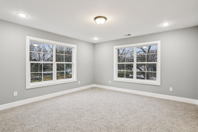 view of carpeted spare room