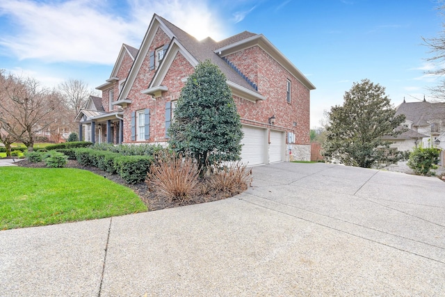 view of property exterior featuring a yard and a garage