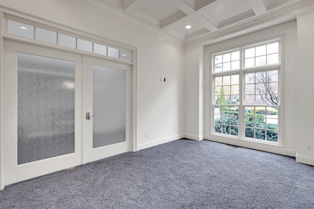 unfurnished room with carpet floors, french doors, beamed ceiling, and ornamental molding