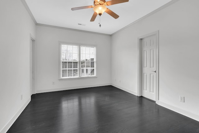 unfurnished room featuring ceiling fan, ornamental molding, and dark wood-type flooring