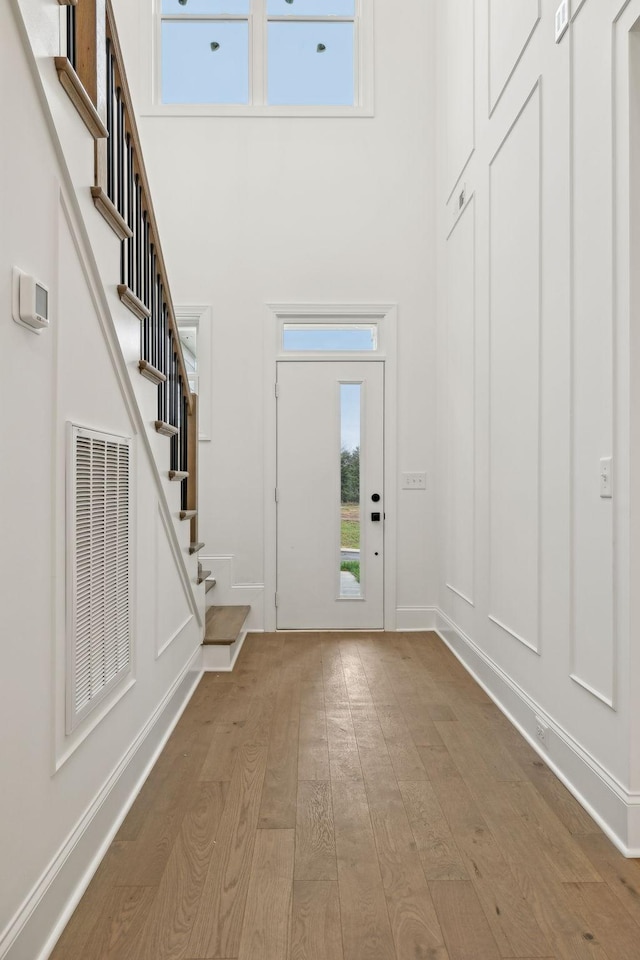 517 Matthew Miller Dr, Smyrna, TN 37167 - foyer featuring a high ceiling, hardwood / wood-style floors, and stairs