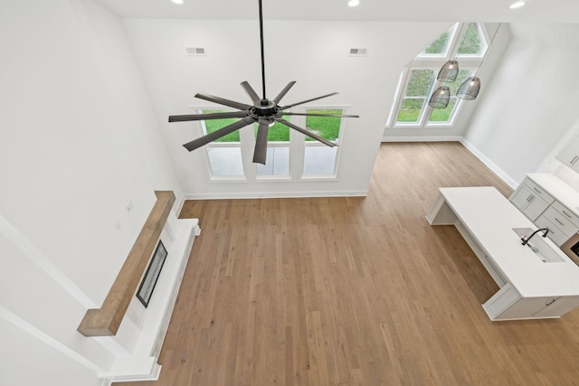 517 Matthew Miller Dr, Smyrna, TN 37167 - unfurnished living room featuring ceiling fan, wood finished floors, and recessed lighting
