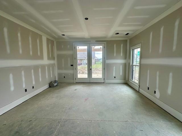 spare room with french doors