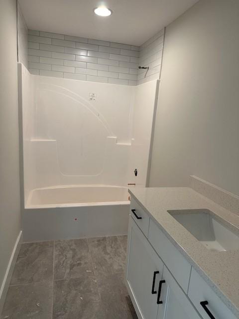 full bathroom featuring shower / bathtub combination and vanity