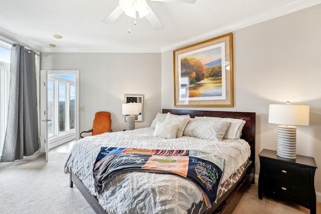 bedroom featuring ceiling fan, light colored carpet, and ornamental molding