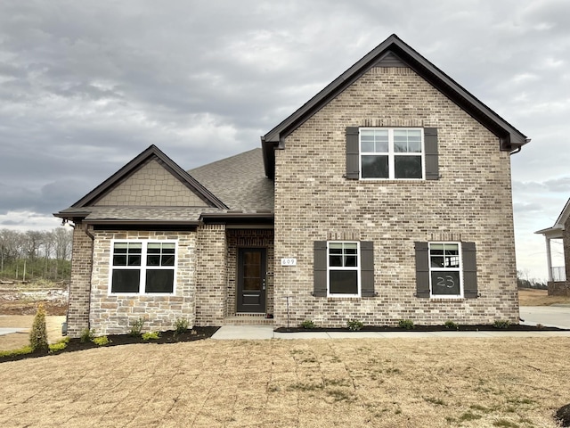 609 Spring Hill Dr, Smyrna, TN 37167 - view of front of property featuring a shingled roof and brick siding