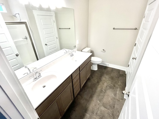 609 Spring Hill Dr, Smyrna, TN 37167 - bathroom featuring concrete flooring, double vanity, and a shower with door