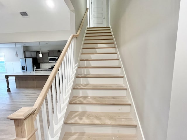 609 Spring Hill Dr, Smyrna, TN 37167 - stairs featuring wood finished floors